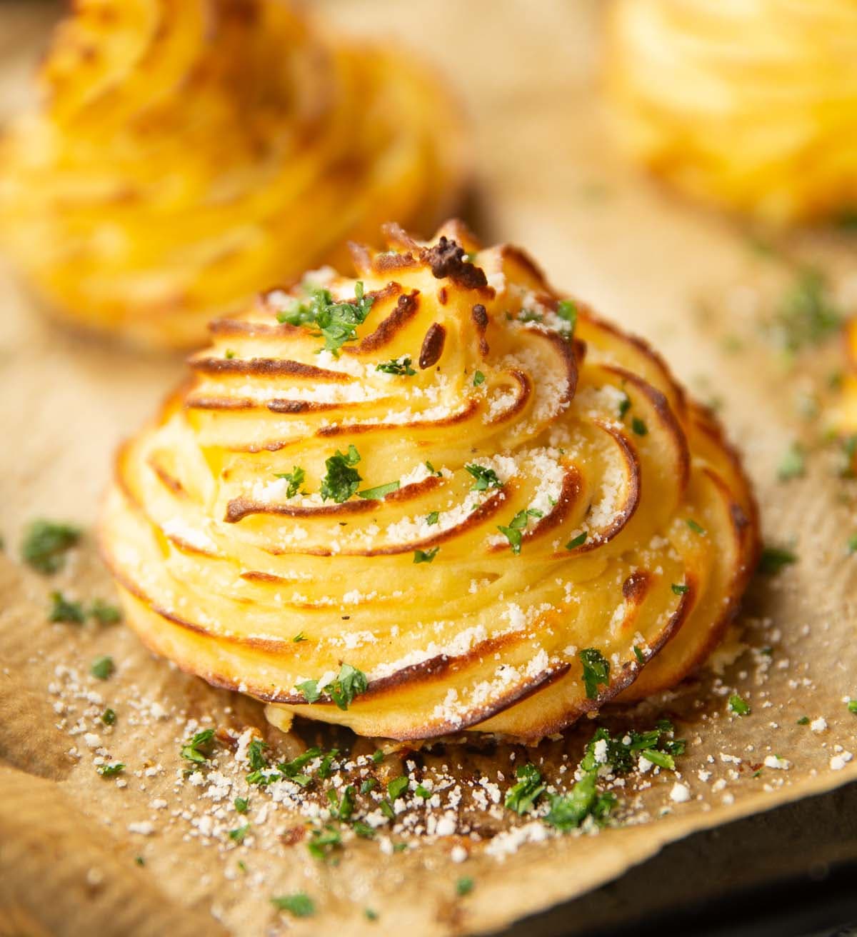 Garlic Parmesan Duchess Potatoes with Roasted Garlic